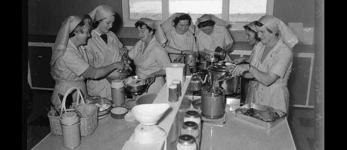 Ladies in the kitchen for Meals on Wheels in 1950s