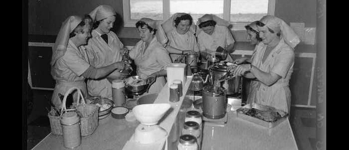 Ladies in the kitchen for Meals on Wheels in 1950s